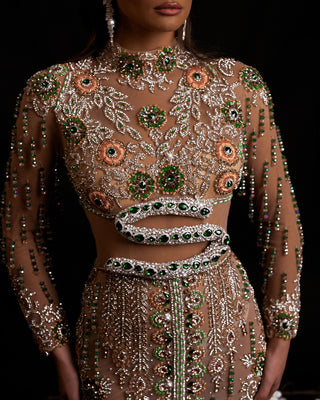 Close-Up of Serpent Motif and Rhinestone Details on Dress