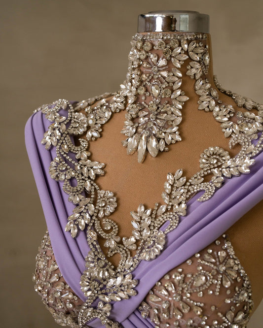 Close-Up of Gemstone Embellishments on Purple Dress