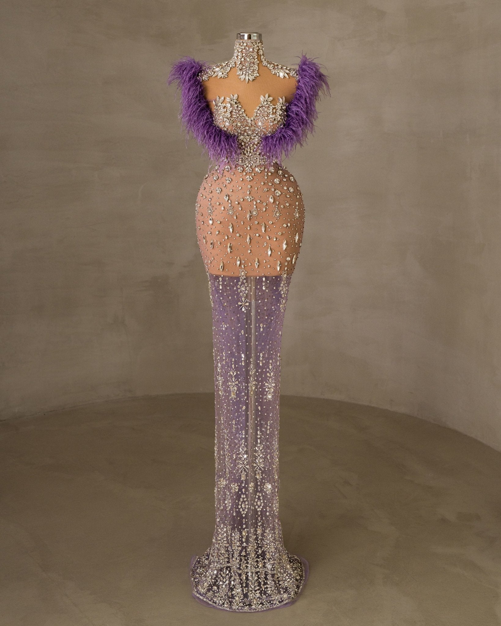 Elegant Sleeveless Dress with Feather Detailing and Gemstone Embellishments