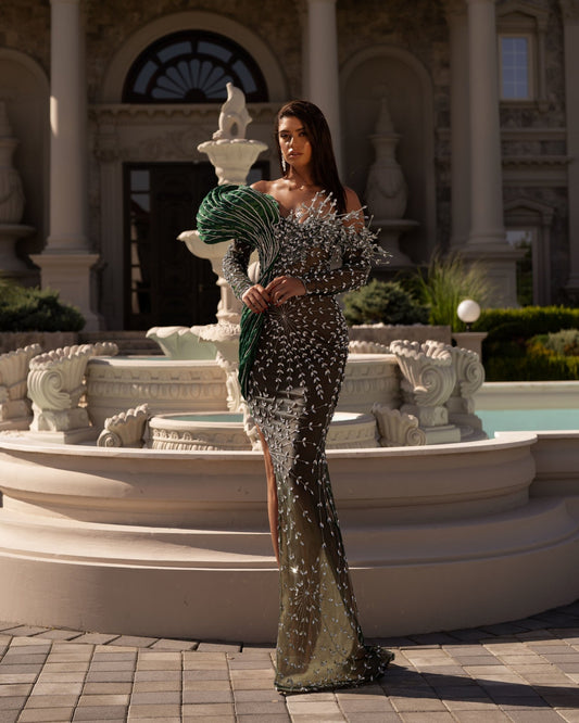 Fashion Model Showcasing Green Dress with Stone Embellishments