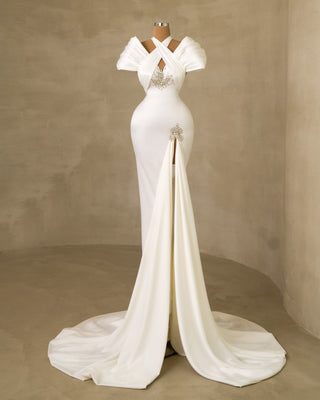 Glamorous Bridal Gown: Deep Slit and Shimmering Stone Accents