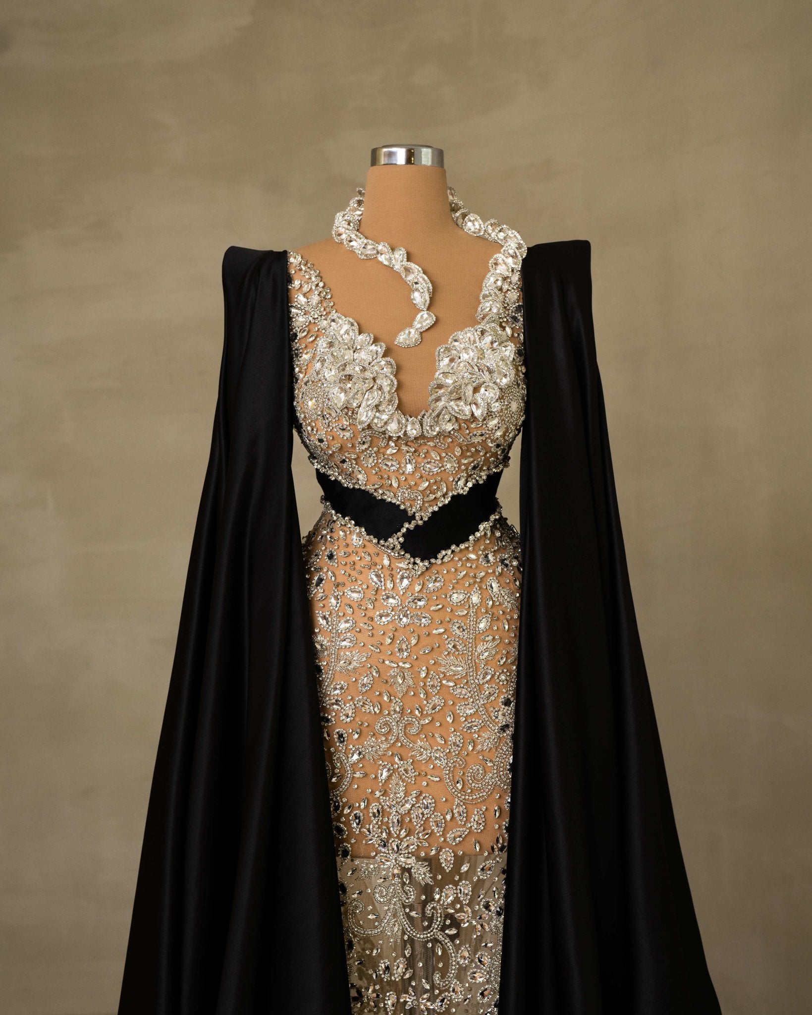 Elegant Side Cape Dress with Glistening Stone Embellishments