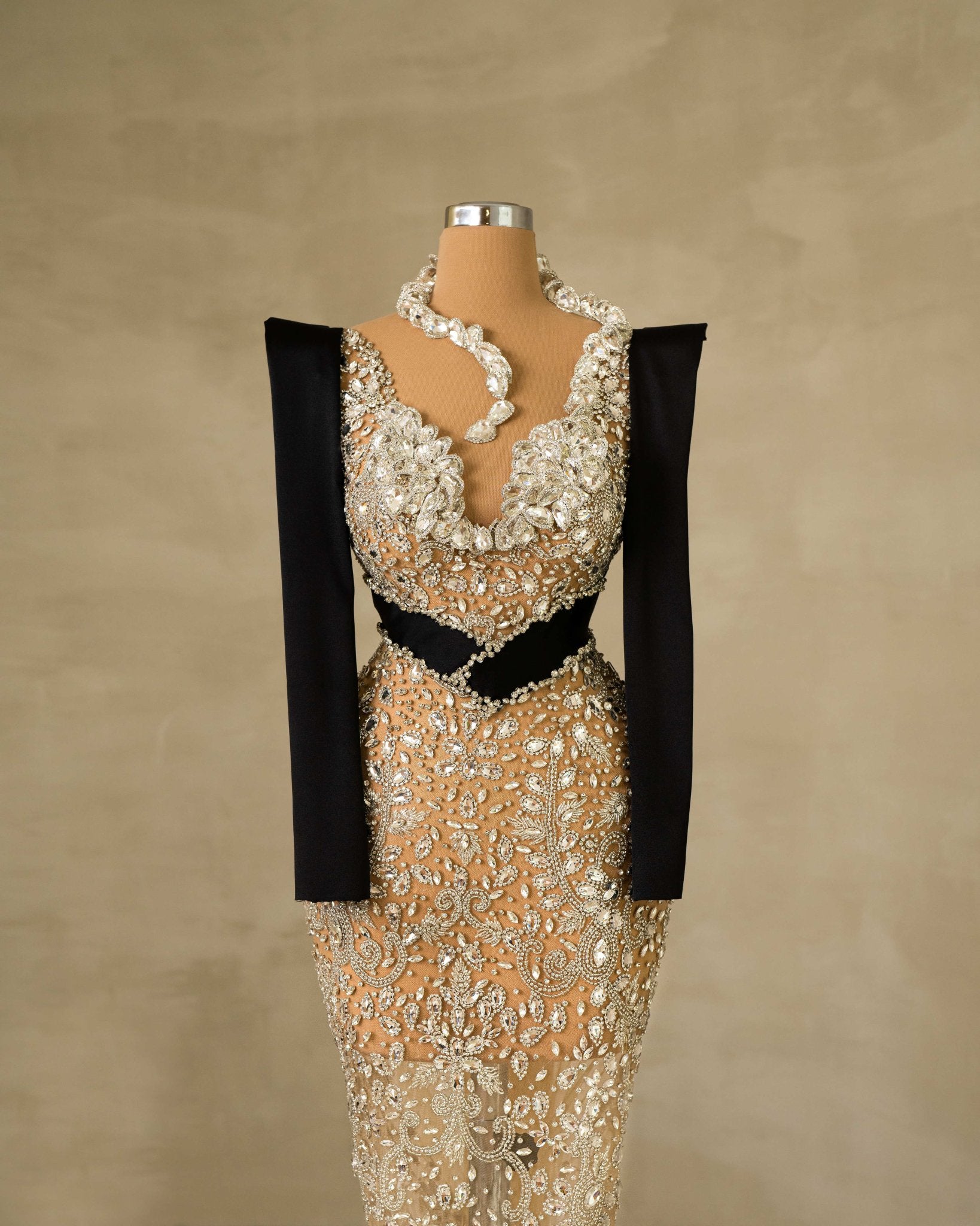 Chic Dress with Intricate Neck Detail and Stunning Stone Embellishments