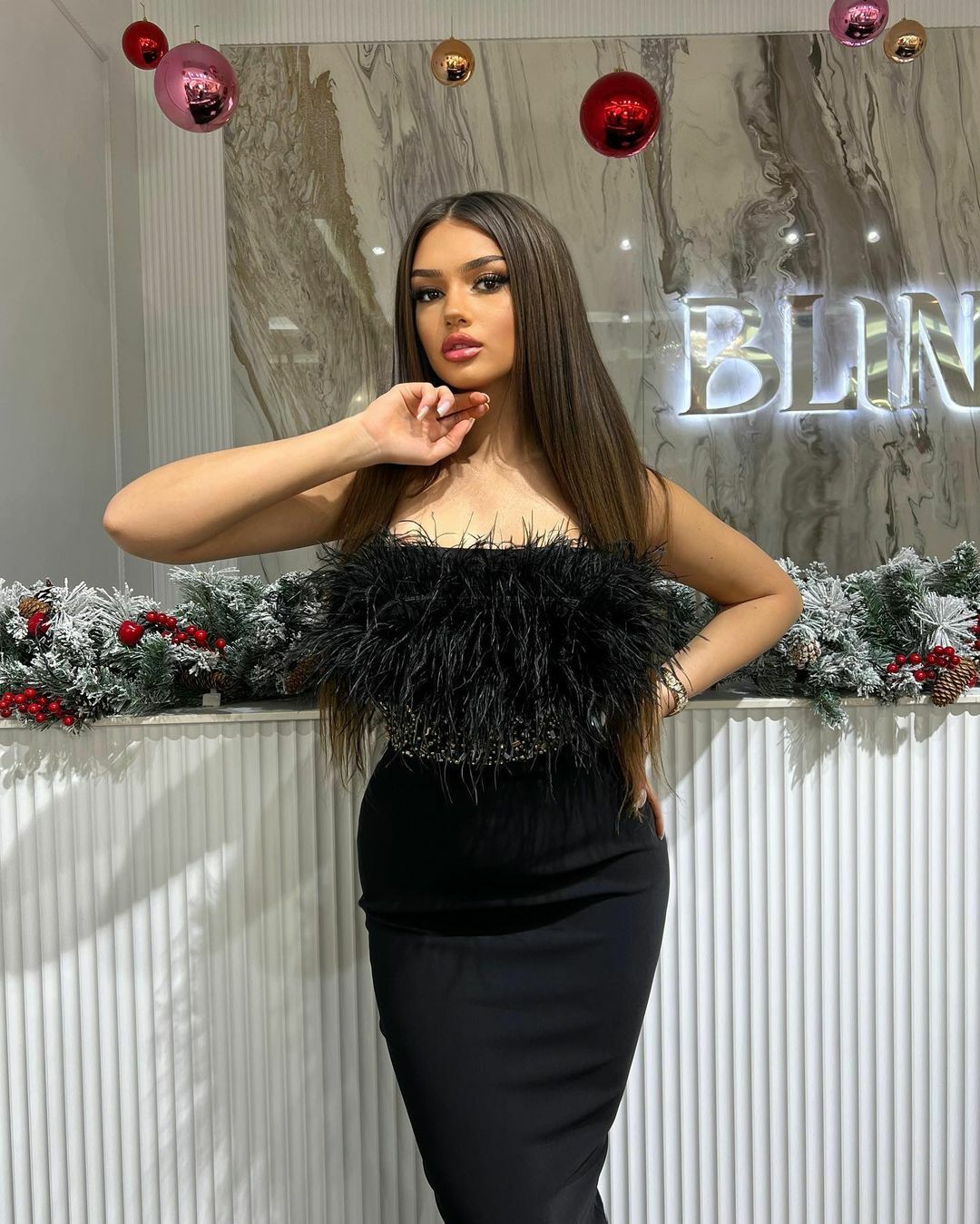 Elegant Black Maxi Dress - Thin Straps, Feather Bodice, and Stone Embellishments