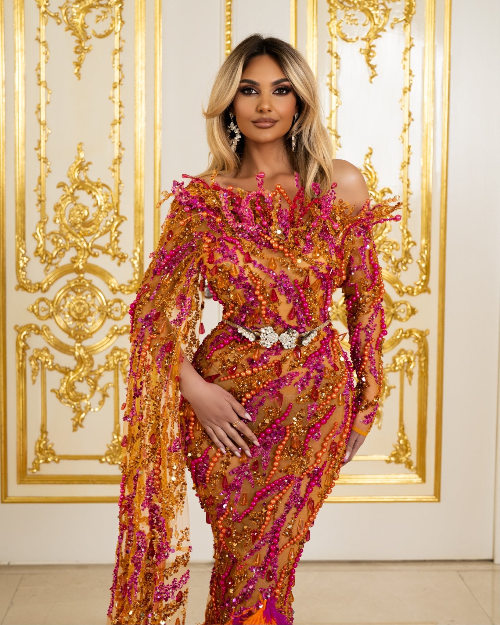 Elegant Pearls and Feathers Embellished Dress with Stylish Side Cape - Shop Now