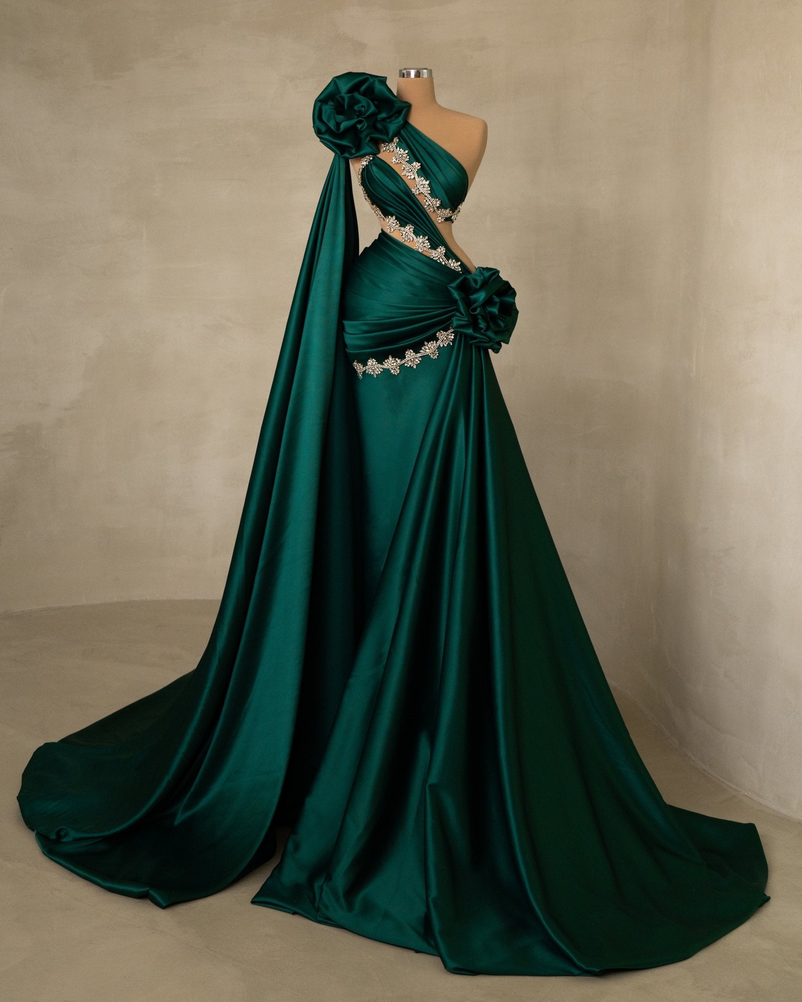 Luxurious Green Satin Gown with Dramatic Side Tail