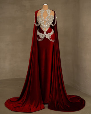 Velvet dress in deep red, a timeless choice.