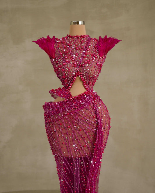 Fashionable Dress with Stunning Beadwork and Feather Details