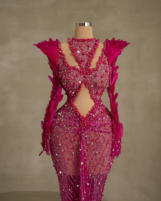 Fashionable Cutout Dress with Beaded Details and Feather Accents