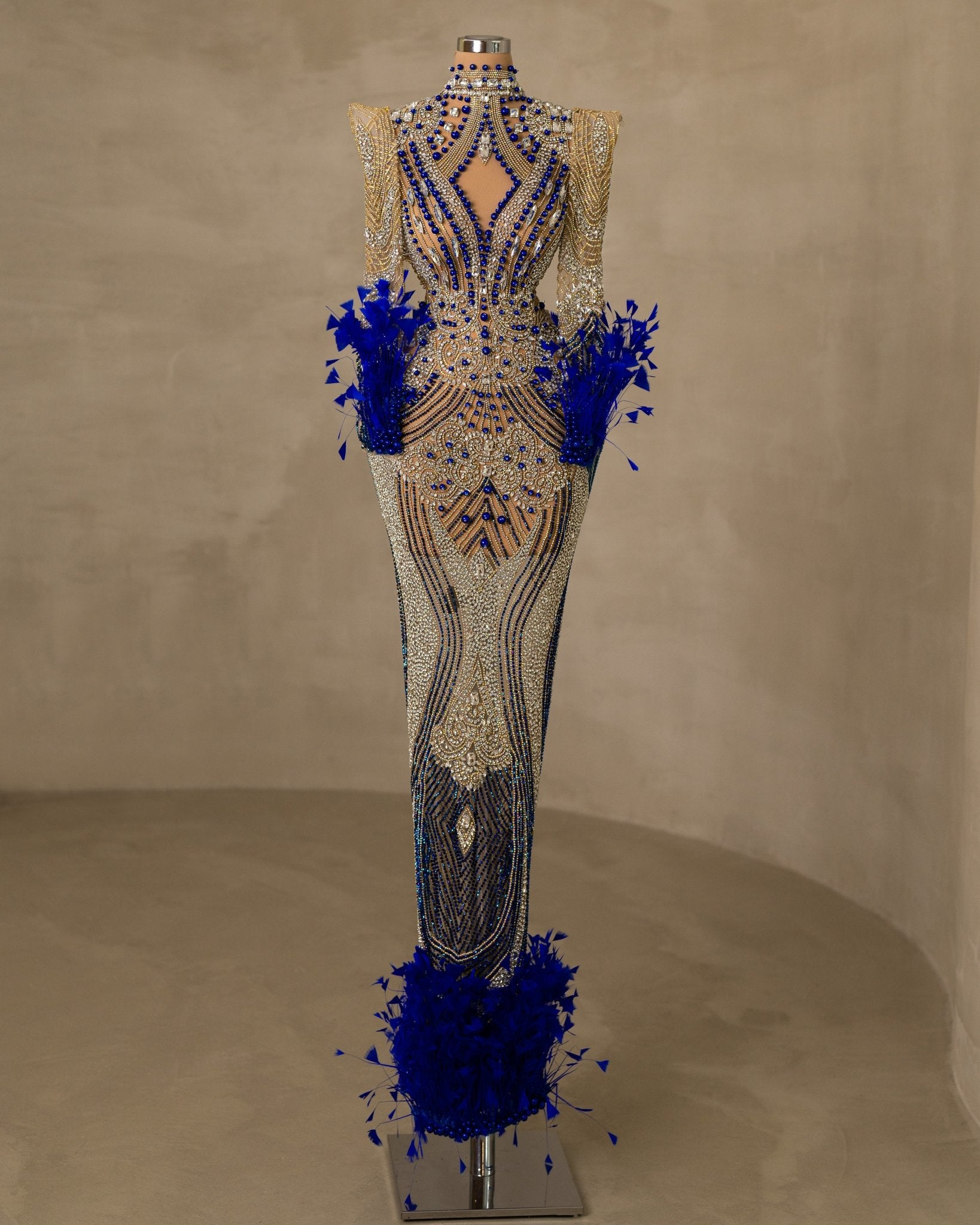 Stunning Dress with Feather and Stone Embellishments on Cut-in Chest Design