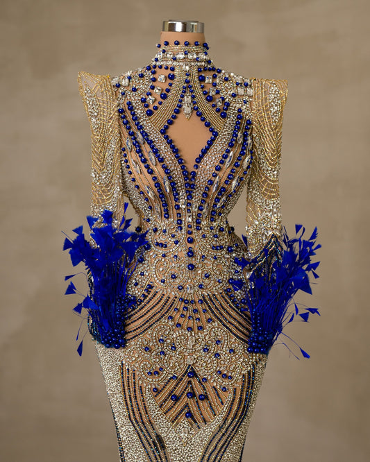 Elegant Cut-in Chest Dress Adorned with Stones and Feather Embellishments