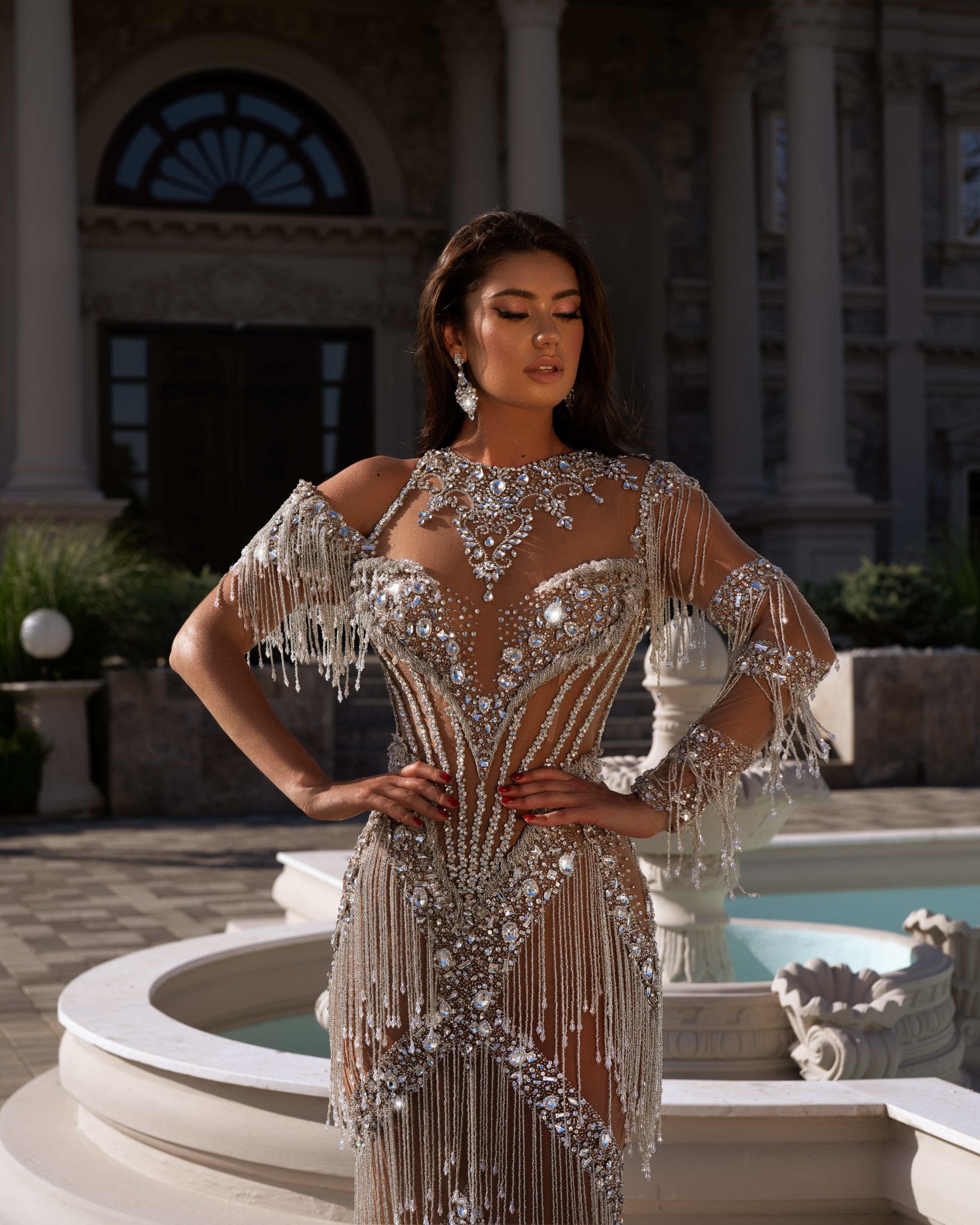 Elegant Silver Dress with Shimmering Stones and Tassels