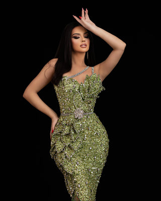A glamorous green dress embellished with sequins