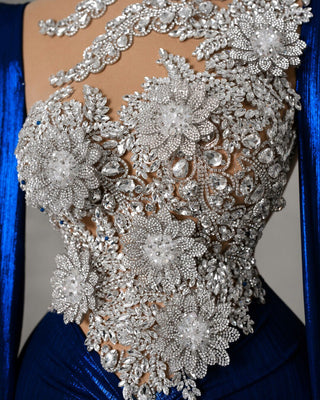 Details of Silver Crystal Embellishments on Blue Dress
