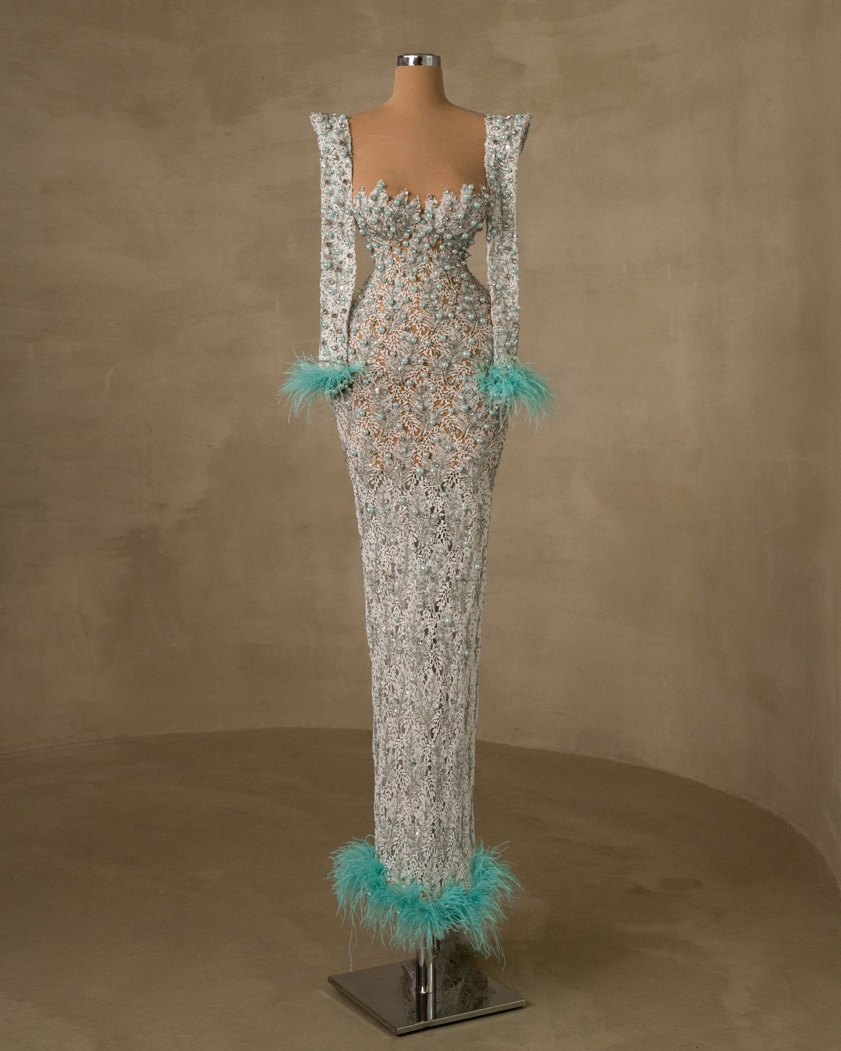 Blue Feathered Dress: Unique Bead and Feather Accents