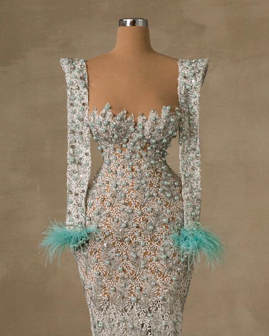 Elegant Blue Evening Gown with Feather and Bead Embellishments