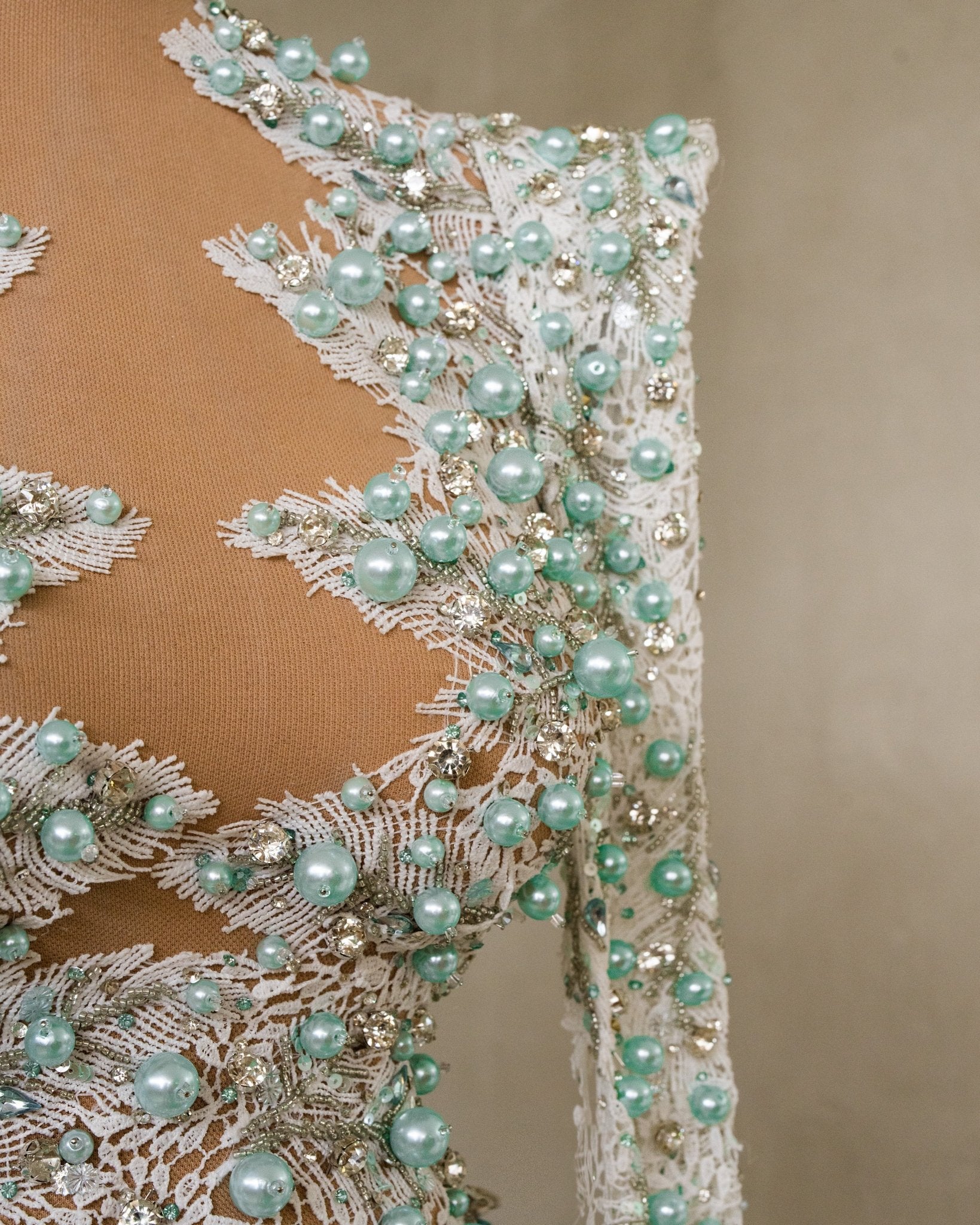 Intricate Bead and Feather Accents on Short Blue Dress