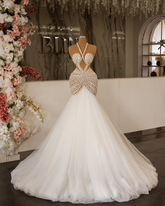Modern Bridal Dress Featuring Cut-Outs, Tulle, and Crystal Embellishments