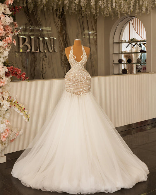 Elegant Bridal Dress Featuring V-Neckline and Shimmering Crystals