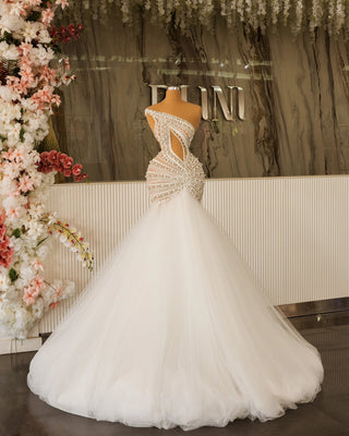 Chic Bridal Dress Featuring Unique Cut-Out and Crystals