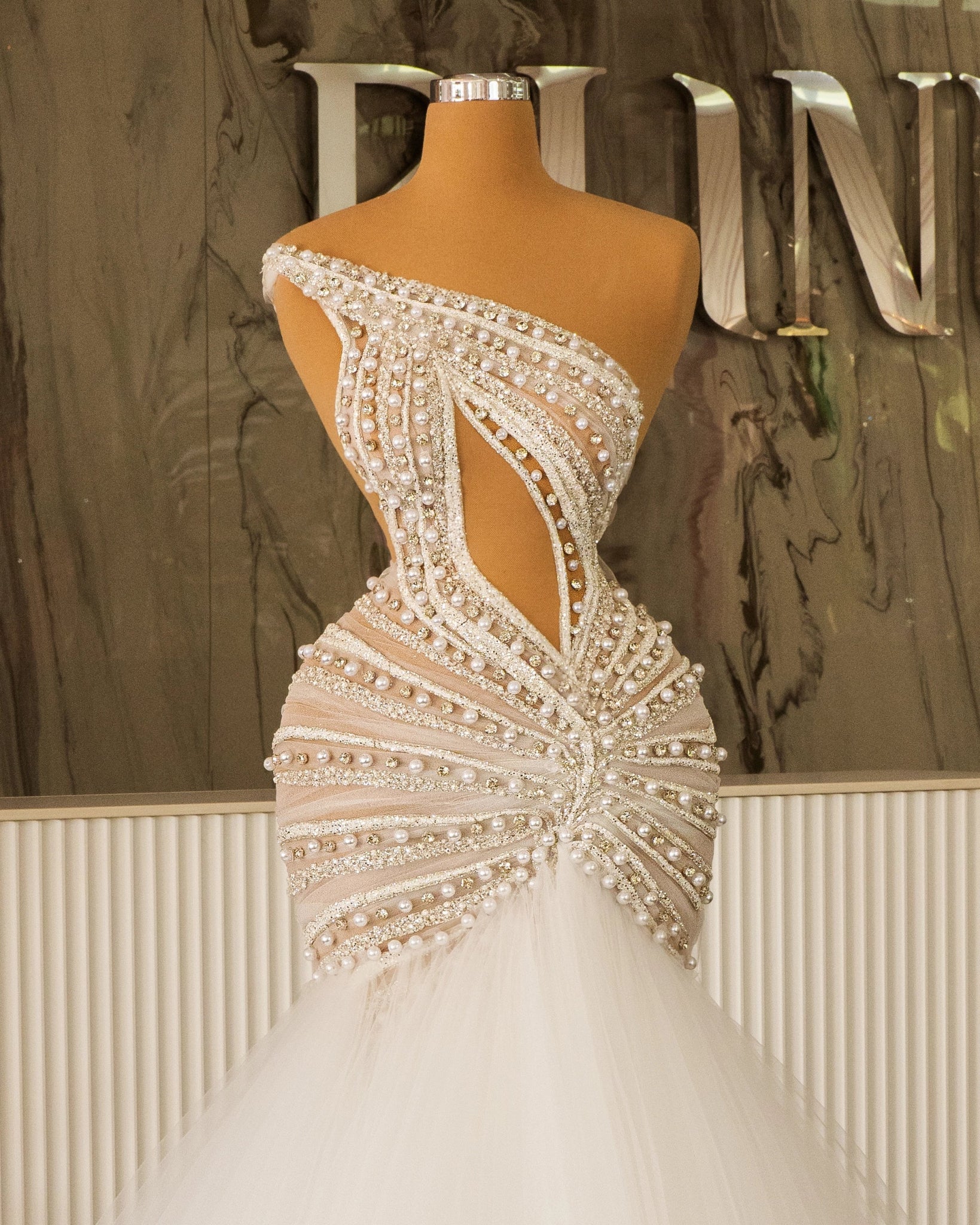 Elegant Sleeveless Bridal Gown with Crystal Embellishments
