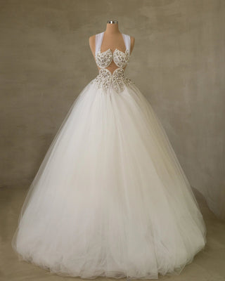 Modern Bridal Gown Featuring a Chic Chest Cut-Out and Sparkling Crystals"