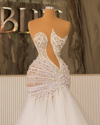 Elegant Sleeveless Bridal Gown with Crystal Embellishments