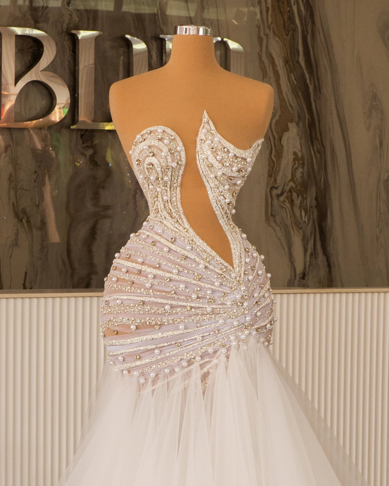 Elegant Sleeveless Bridal Gown with Crystal Embellishments