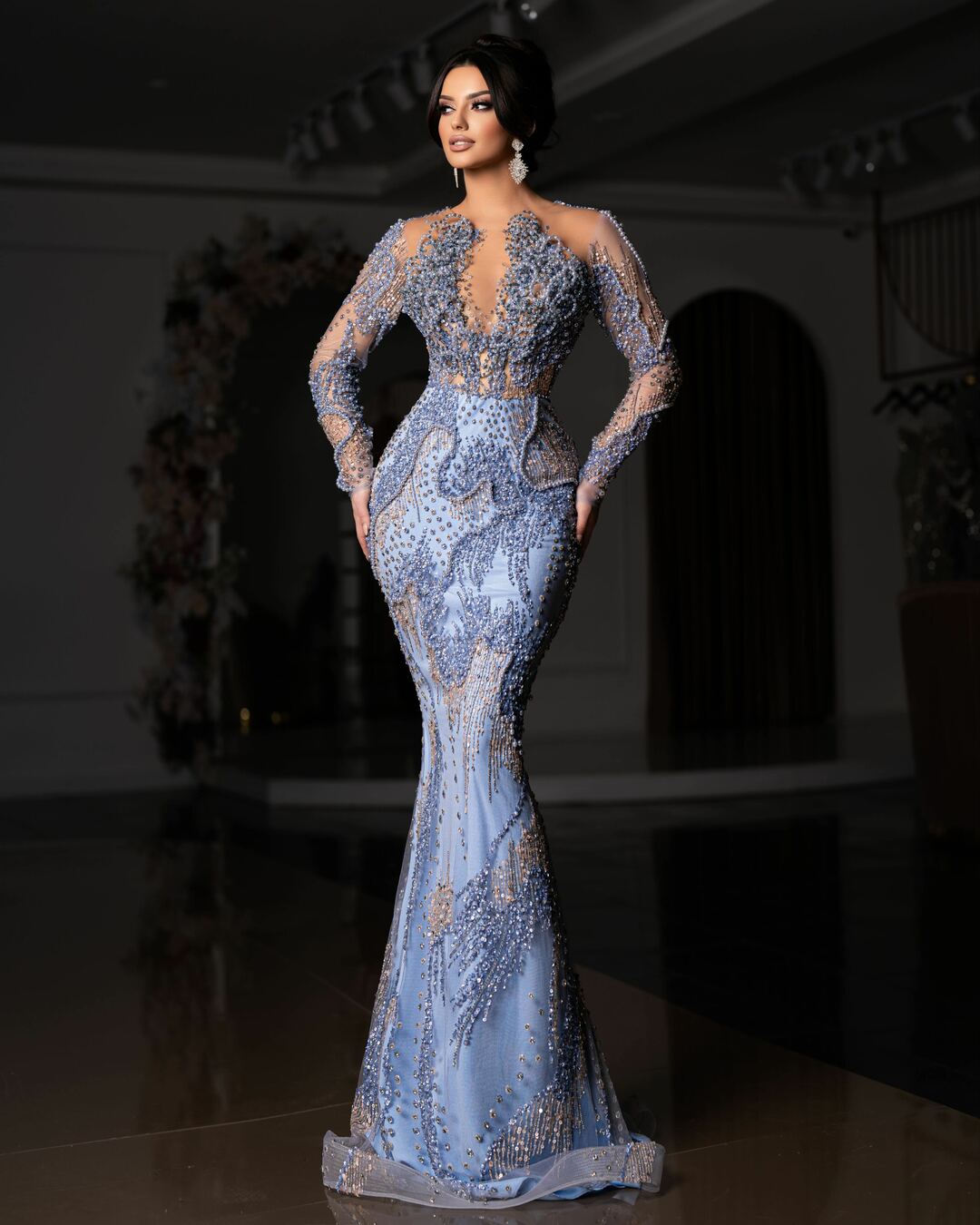 Elegant light blue gown with intricate beadwork