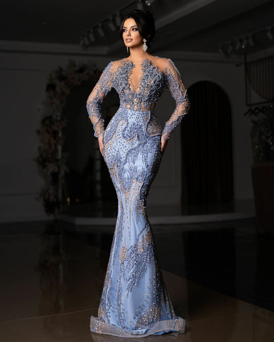Elegant light blue gown with intricate beadwork